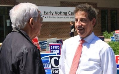 Then State Sen. Jamie Raskin talks to a supporter who voted early for him on Wednesday, April 20, 2016 before he successfully won his seat to represent Maryland's 8th congressional district in the House of Representatives. (AP Photo/Brian Witte)