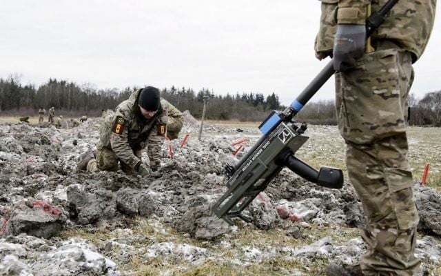 In this Wednesday, March 8, 2017 photo, members of the Danish military check for wreckage from a World War II airplane which was found, by teenager Rom Kristiansen, near Birkelse, Denmark. (Rene Schuetze/Polfoto via AP) In this Wednesday, March 8, 2017 photo, members of the Danish military check for wreckage from a World War II airplane which was found, by teenager Rom Kristiansen, near Birkelse, Denmark. (Rene Schuetze/Polfoto via AP)