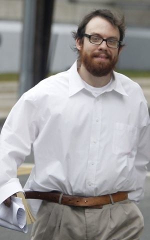 Notorious computer hacker and internet troll Andrew Auernheimer leaves the Martin Luther King, Jr. Courthouse after posting bail in Newark, N.J. Auernheimer, February 28, 2011. (AP Photo/Julio Cortez. File)