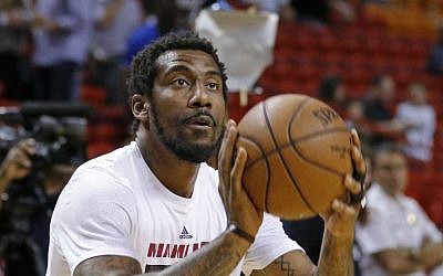 In this March 28, 2016 file photo, then-Miami Heat forward Amar'e Stoudemire shoots during warmups before the Heat met the Brooklyn Nets in an NBA basketball game, in Miami. (AP Photo/Joe Skipper, File)