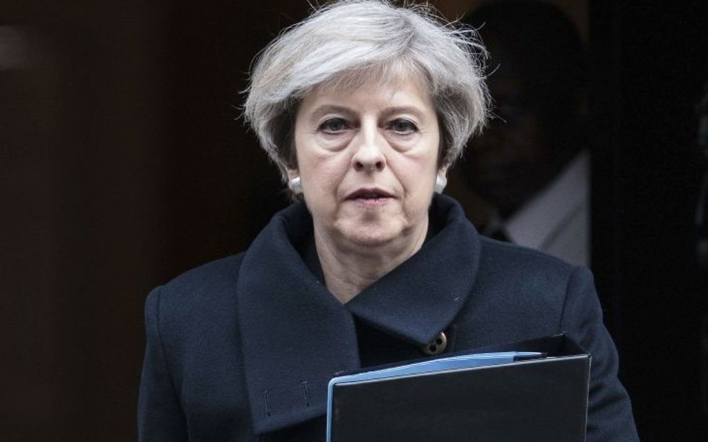 Britain's Prime Minister Theresa May leaves 10 Downing Street in London on her way to parliament, Thursday March 23, 2017, following the attack in London Wednesday. ( Jack Taylor/Pool via AP)