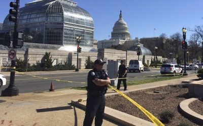 Capitol Hill police stand guard at the Botanical Gardens on Capitol Hill on Washington, Wednesday, March 29, 2017. police said. (AP/Michael Biesecker)