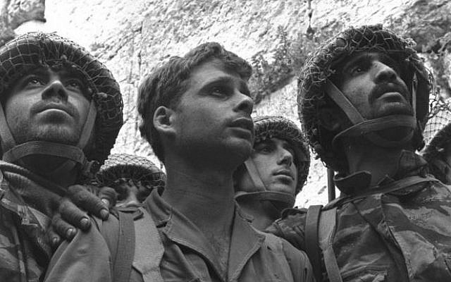 The iconic Rubinger photo of the three paratroopers at the recaptured Western Wall in June 1967 (Courtesy Rubinger/Knesset Collection) The iconic Rubinger photo of the three paratroopers at the recaptured Western Wall in June 1967 (Courtesy Rubinger/Knesset Collection)