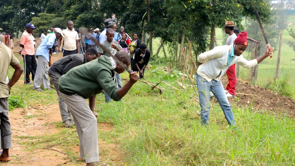 Residents of Kimani Village in Kigali, Rwanda, take part in the monthly Umuganda community service on February 25, 2017. (Melanie Lidman/Times of Israel)