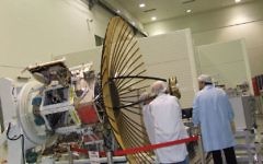 Workers next to the IDF/AF TECSAR, an advanced imaging satellite produced by IAI (IAI via Tsahi Ben-Ami / Flash90)