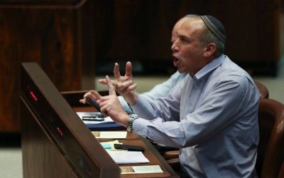 Jewish Home MK Motti Yogev reacts during a special meeting of the 65th year of the establishment of the Knesset in Jerusalem on January 14, 2014. (Yonatan Sindel/Flash90) Jewish Home MK Motti Yogev reacts during a special meeting of the 65th year of the establishment of the Knesset in Jerusalem on January 14, 2014. (Yonatan Sindel/Flash90)