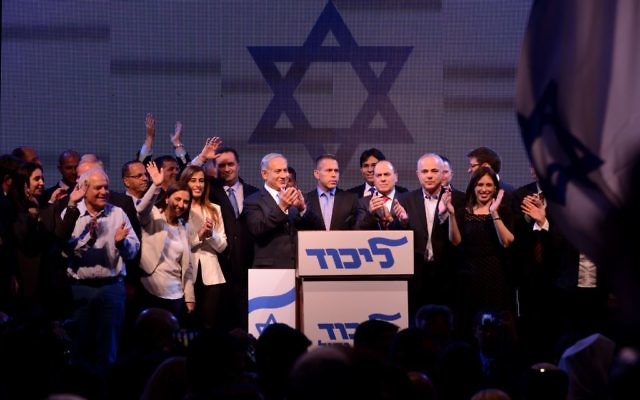Prime Minister Benjamin Netanyahu flanked by members of his Likud party at launch of the Likud election campaign, January 5 2015. (Gili Yaari/Flash90)