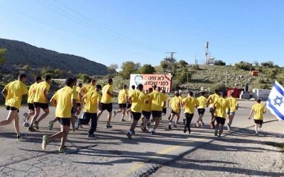Illustrative: Golani Brigade soldiers participate in the Golani Brigade Race on April 26, 2015. (IDF Spokesperson/Flash90)