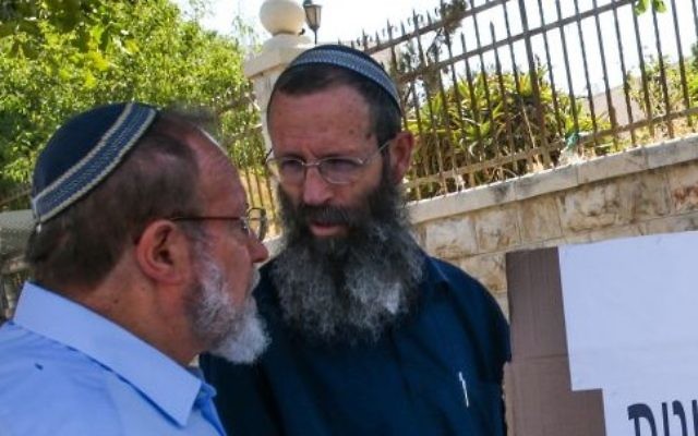Eli pre-army academy heads Rabbi Eli Sadan (L) and Rabbi Yigal Levinstein protest outside Prime Minister Benjamin Netanyahu's house in Jerusalem against the government's response to a wave of terror attacks, July 1, 2015. (Nati Shohat/Flash90) Eli pre-army academy heads Rabbi Eli Sadan (L) and Rabbi Yigal Levinstein protest outside Prime Minister Benjamin Netanyahu's house in Jerusalem against the government's response to a wave of terror attacks, July 1, 2015. (Nati Shohat/Flash90)