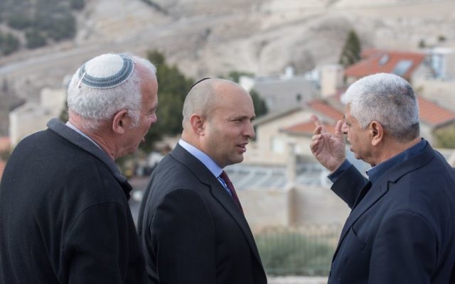 Jewish Home party chairman Naftali Bennett (C) speaks with Mayor of Ma'ale Adumim Benny Kasriel (R) before the start of a special party faction meeting in the Israeli settlement of Ma'ale Adumim, in the West Bank, on January 2, 2017. (Yonatan Sindel/Flash90) Jewish Home party chairman Naftali Bennett (C) speaks with Mayor of Ma'ale Adumim Benny Kasriel (R) before the start of a special party faction meeting in the Israeli settlement of Ma'ale Adumim, in the West Bank, on January 2, 2017. (Yonatan Sindel/Flash90)