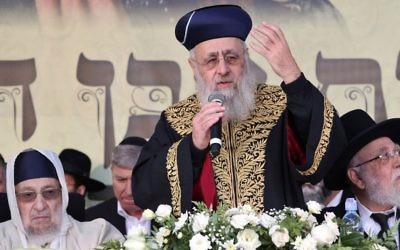 Chief Sephardic Rabbi Yitzhak Yosef, center, and Rabbi Baruch Abuhatzeiraseen at the gravesite of Rabbi Yisrael Abuhatzeira in the southern Israeli town of Netivot on January 30, 2017. (Yaakov Cohen/Flash90) Chief Sephardic Rabbi Yitzhak Yosef, center, and Rabbi Baruch Abuhatzeiraseen at the gravesite of Rabbi Yisrael Abuhatzeira in the southern Israeli town of Netivot on January 30, 2017. (Yaakov Cohen/Flash90)