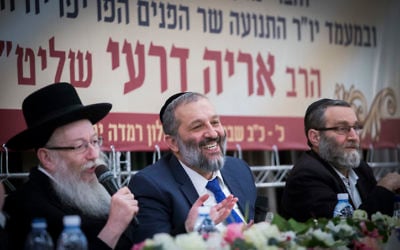 Interior Minister Aryeh Deri (C), Health Minister Yaakov Litzman (L) and United Torah Judaism MK Moshe Gafni attend the third Shas conference at Ramada hotel in Jerusalem on February 16, 2017. (Yonatan Sindel/Flash90)