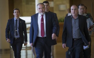 Defense Minister Avigdor Liberman arrives to the Defense and Foreign Affairs Committee meeting at the Knesset, on March 6, 2017. (Yonatan Sindel/Flash90)