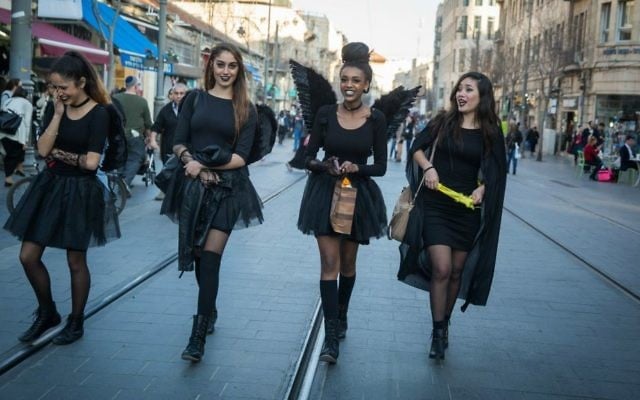 With costumes and alcohol, jovial Israel marks Purim holiday | The Times of  Israel