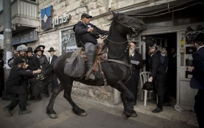 Ultra-Orthodox Jews protest in Jerusalem against the jailing of a Jewish seminary student who failed to comply with an army recruitment order, March 15, 2017. (Yonatan Sindel/Flash90)
