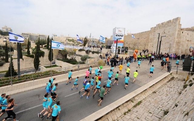Thousands of runners take part in the 2017 international Jerusalem Marathon on March 17, 2017. (Mendy Hechtman/Flash90) Thousands of runners take part in the 2017 international Jerusalem Marathon on March 17, 2017. (Mendy Hechtman/Flash90)