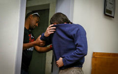 An Israeli-American Jewish teenager, accused of making dozens of anti-Semitic bomb threats in the United States and elsewhere, in a courtroom in Rishon Lezion on March 23, 2017. (Flash90)