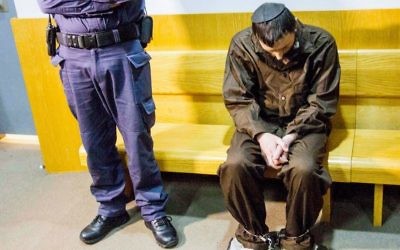 Meir Ephraim Goldstein, suspected of beheading his wife in burning her body in Tiberias, is seen at the Nazareth Magistrate's Court as he arrives for a hearing on March 30, 2017. (Flash90)