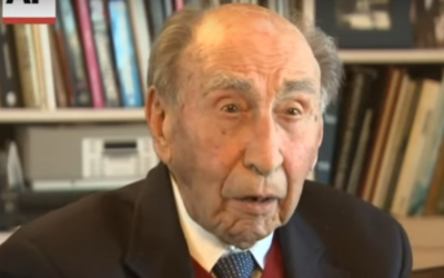Former AP correspondent George E. Bria. (Screen capture: YouTube)