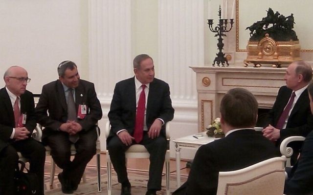 Prime Minister Benjamin Netanyahu (center) meets with Russian President Vladimir Putin in Moscow (right) on Thursday, March 9, 2017 (Israeli embassy in Moscow) Prime Minister Benjamin Netanyahu (center) meets with Russian President Vladimir Putin in Moscow (right) on Thursday, March 9, 2017 (Israeli embassy in Moscow)