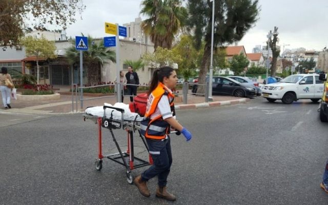 Scene of an alleged arson attack in the city of Holon in central Israel, March 14, 2017 (Magen David Adom spokesperson) Scene of an alleged arson attack in the city of Holon in central Israel, March 14, 2017 (Magen David Adom spokesperson)