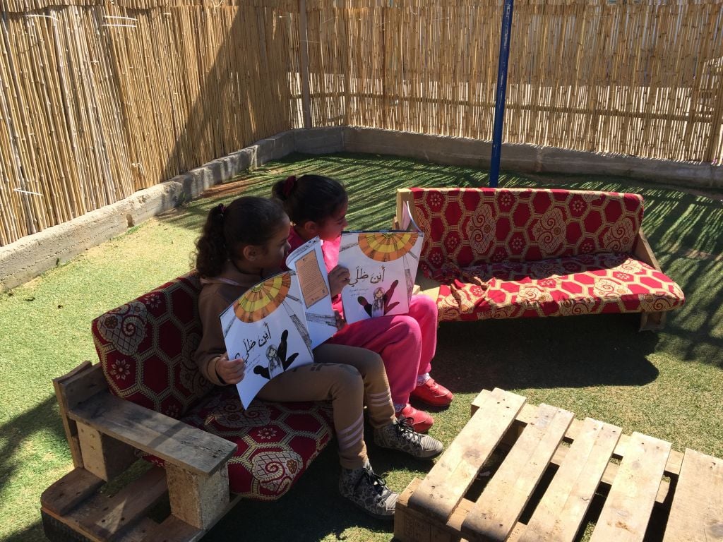 Reading 'xxxx', a Maktabat al-Fanoos book at a Lod kindergarten (Jessica Steinberg/Times of Israel)