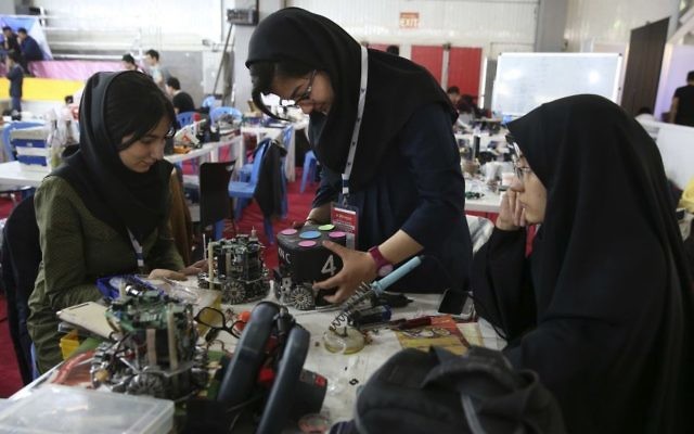 Iranian students prepare their robots during the international robotics competition, RoboCup Iran Open 2016, in Tehran, Iran, April 6, 2016. (AP/Vahid Salemi/File) Iranian students prepare their robots during the international robotics competition, RoboCup Iran Open 2016, in Tehran, Iran, April 6, 2016. (AP/Vahid Salemi/File)