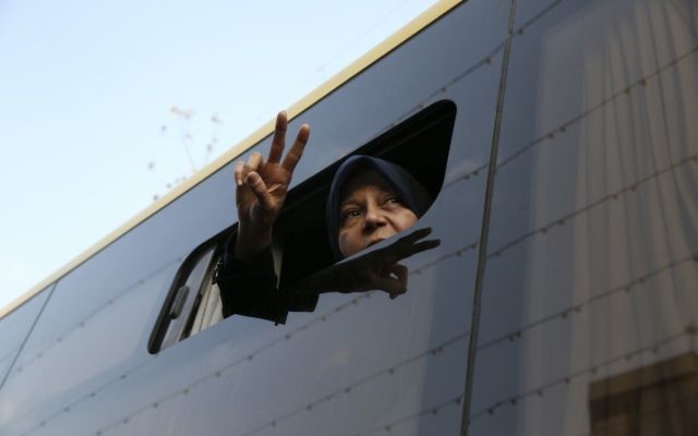 Faezeh Hashemi, daughter of Iran's former President Akbar Hashemi Rafsanjani, who died in January after suffering a heart attack, flashes a victory sign to the crowd from a bus during the funeral ceremony of his father in Tehran, Iran, January 10, 2017. (AP Photo/Vahid Salemi, File) Faezeh Hashemi, daughter of Iran's former President Akbar Hashemi Rafsanjani, who died in January after suffering a heart attack, flashes a victory sign to the crowd from a bus during the funeral ceremony of his father in Tehran, Iran, January 10, 2017. (AP Photo/Vahid Salemi, File)