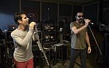 Iranian Shahin Najafi, right, and Israeli Aviv Geffen rehearse in Tel Aviv on February 27, 2017. (AP/Dan Balilty)