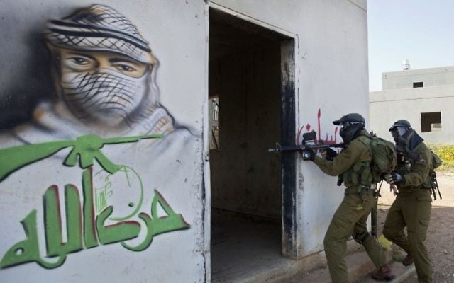 In this Wednesday, March 29, 2017 photo, Israeli soldiers train with paintball guns during a drill at an Army base near Elyakim, Israel. (AP/Sebastian Scheiner) In this Wednesday, March 29, 2017 photo, Israeli soldiers train with paintball guns during a drill at an Army base near Elyakim, Israel. (AP/Sebastian Scheiner)