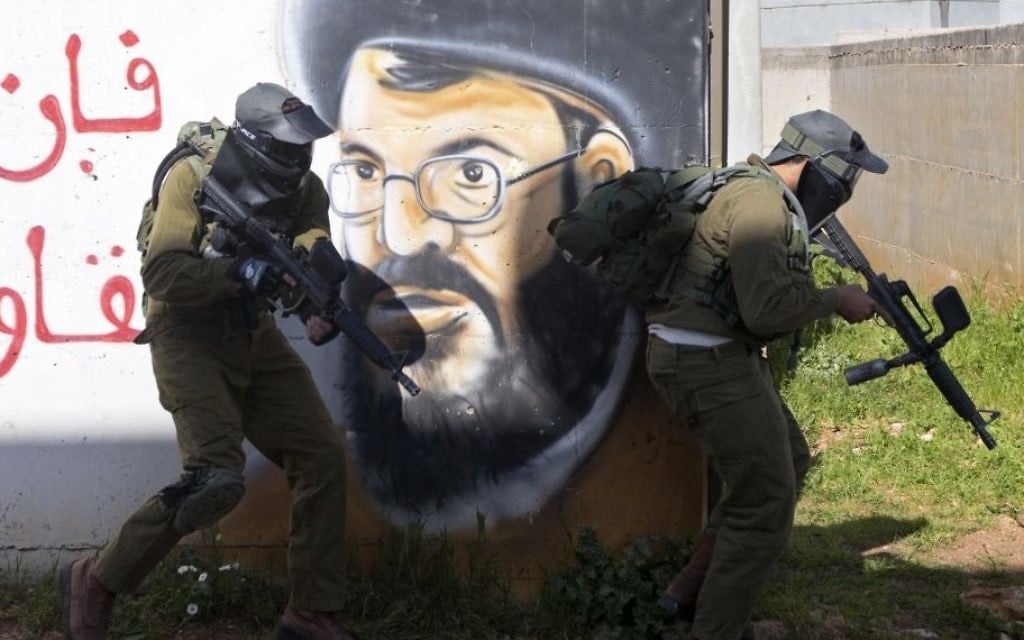 In this Wednesday, March 29, 2017 photo, Israeli soldiers train with paintball guns during a drill at an Army base near Elyakim, Israel. (AP Photo/Sebastian Scheiner) In this Wednesday, March 29, 2017 photo, Israeli soldiers train with paintball guns during a drill at an Army base near Elyakim, Israel. (AP Photo/Sebastian Scheiner)