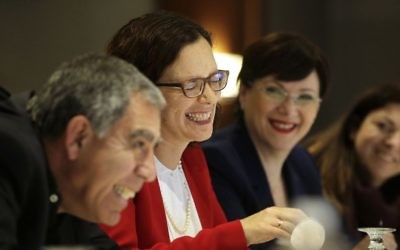 In this Tuesday, March 28, 2017 photo Israeli lawmakers, from the left, Mickey Levy (Yesh Atid), Rachel Azaria (Kulanu) and Tali Ploskov (Kulanu) laugh during an interview with a reporter from The Associated Press, in Boston. (Steven Senne/AP)