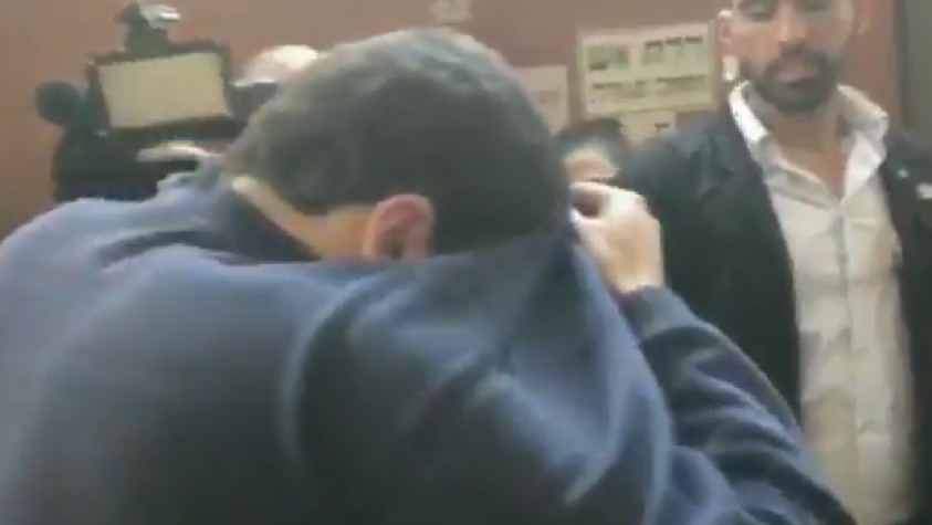 The Israeli-American teenager suspected of making hundreds of fake bomb threats to JCCs and other Jewish institutions in the US and elsewhere leaves the Rishon Lezion Magistrate's Court on Thursay, March 23, 2017, where his remand was exended for 8 days. (Screenshot/Channel 10) The Israeli-American teenager suspected of making hundreds of fake bomb threats to JCCs and other Jewish institutions in the US and elsewhere leaves the Rishon Lezion Magistrate's Court on Thursay, March 23, 2017, where his remand was exended for 8 days. (Screenshot/Channel 10)