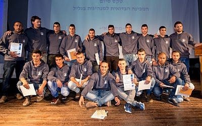 The 15 participants of Israel's first army preparatory program geared towards Bedouin Israelis at their graduation ceremony on February 28, 2017. (Courtesy)