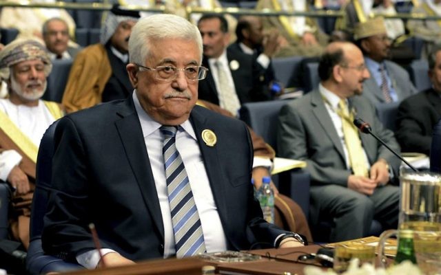 In this March 26, 2014 photo, Palestinian President Mahmoud Abbas attends the closing session of the Arab League Summit at Bayan Palace, Kuwait. (AP Photo/Nasser Waggi) In this March 26, 2014 photo, Palestinian President Mahmoud Abbas attends the closing session of the Arab League Summit at Bayan Palace, Kuwait. (AP Photo/Nasser Waggi)