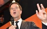 Prime Minister Mark Rutte of the free-market VVD party speaks to his supporters after exit poll results of the parliamentary elections were announced in The Hague, Netherlands, Wednesday, March 15, 2017. (Patrick Post/AP)