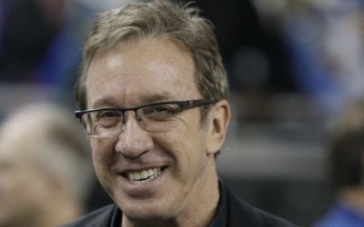 In this Nov. 27, 2014, file photo, comedian Tim Allen is seen on the sidelines before the first half of an NFL football game in Detroit. (AP Photo/Duane Burleson, File)
