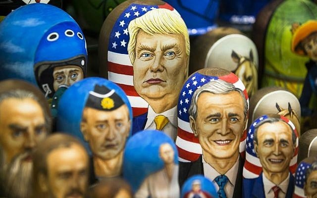 Matryoshkas, traditional Russian wooden dolls, including a doll of US President Donald Trump, top, are displayed for sale in Moscow, Russia, Thursday, March 2, 2017. (AP Photo/Alexander Zemlianichenko)