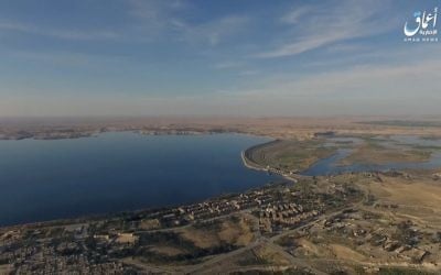 This still image taken from drone footage posted online Monday, March. 27, 2017 shows the Tabqa Dam, in Raqqa, Syria. (Aamaq News Agency via AP)