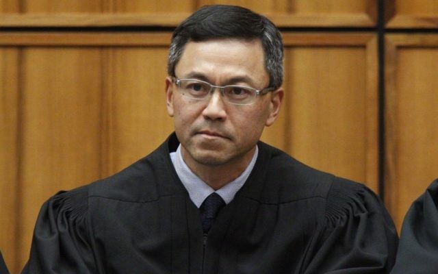 US District Judge Derrick Watson in Honolulu, December 2015 (George Lee/The Star-Advertiser via AP, File) US District Judge Derrick Watson in Honolulu, December 2015 (George Lee/The Star-Advertiser via AP, File)