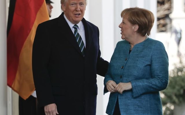 President Donald Trump greets German Chancellor Angela Merkel outside the West Wing of the White House in Washington, Friday, March 17, 2017. (Pablo Martinez Monsivais/AP)