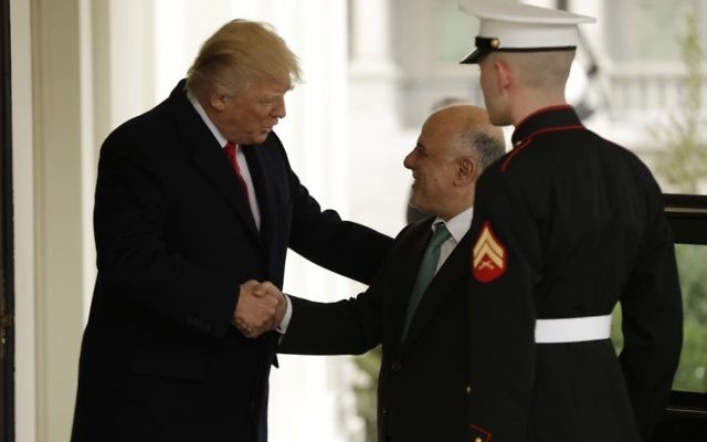 US President Donald Trump greets Iraqi Prime Minister Haider al-Abadi upon his arrival to the White House on March 20, 2017. (Evan Vucci/AP) US President Donald Trump greets Iraqi Prime Minister Haider al-Abadi upon his arrival to the White House on March 20, 2017. (Evan Vucci/AP)