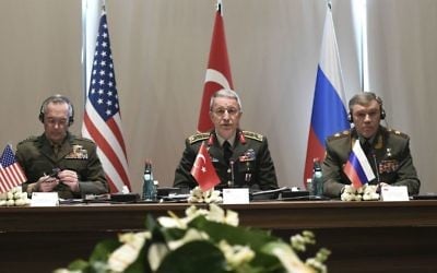 Turkey's Chief of Staff Gen. Hulusi Akar, center, US Chairman of the Joint Chiefs of Staff Gen. Joseph Dunford, left, and Russia's Chief of Staff Gen. Valery Gerasimov attend a meeting in the Mediterranean coastal city of Antalya, Turkey, Tuesday, March 7, 2017. (Turkish Military, Pool Photo via AP)