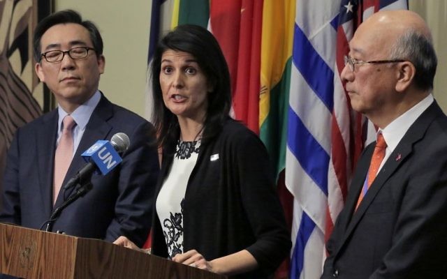 South Korea's Ambassador Cho Tae-yul, left, US Ambassador Nikki Haley, center, and Japan's Ambassador Koro Bessho hold a joint news conference after consultations of the United Nations Security Council, Wednesday, March 8, 2017. (AP Photo/Richard Drew)