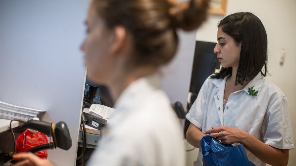 Pharmicists supply patients with prescribed medical marijuana at the 'Tikun Olam' outlet in Tel Aviv. The company has been operating under license from the Ministry of health since 2007. April 10, 2016. (Hadas Parush/Flash90) Pharmicists supply patients with prescribed medical marijuana at the 'Tikun Olam' outlet in Tel Aviv. The company has been operating under license from the Ministry of health since 2007. April 10, 2016. (Hadas Parush/Flash90)