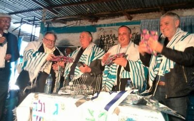 MKs on a cross-party delegation to Ethiopia attend a service with members of Gondar's Jewish community, March 3, 2017. (Courtesy)