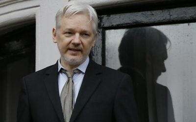 WikiLeaks founder Julian Assange speaks from the balcony of the Ecuadorean Embassy in London, February 5, 2016. (AP/Kirsty Wigglesworth, File)