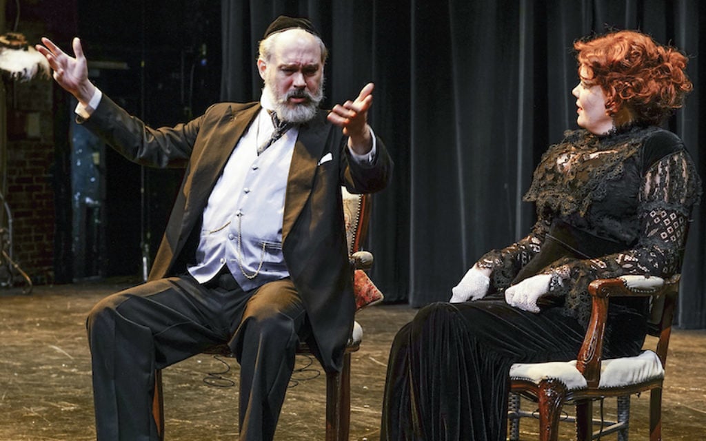 Shane Baker, left, and Caraid O’Brien in the New Yiddish Rep’s current production of 'God of Vengeance.' (Ronald L. Glassman/via JTA) Shane Baker, left, and Caraid O’Brien in the New Yiddish Rep’s current production of 'God of Vengeance.' (Ronald L. Glassman/via JTA)