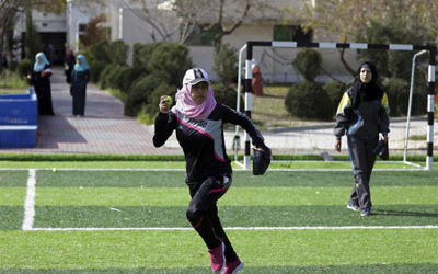 In this Sunday, March 19, 2017 photo, Palestinian women train for an all women's baseball game, on a soccer field, in Khan Younis, southern Gaza Strip. (AP Photo/Khalil Hamra)