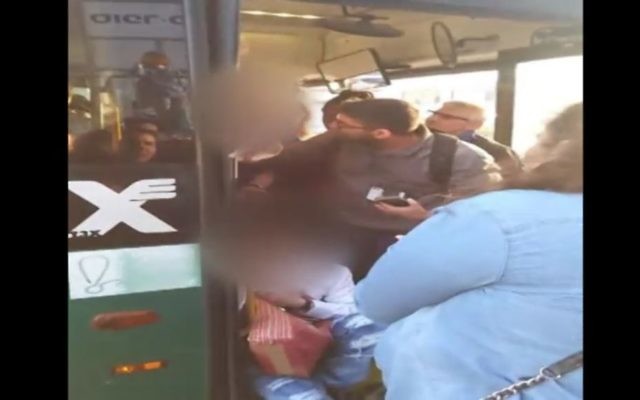 Bus driver allegedly ejects passenger with Down syndrome on March 28, 2017 (Screen capture: Channel 2) Bus driver allegedly ejects passenger with Down syndrome on March 28, 2017 (Screen capture: Channel 2)